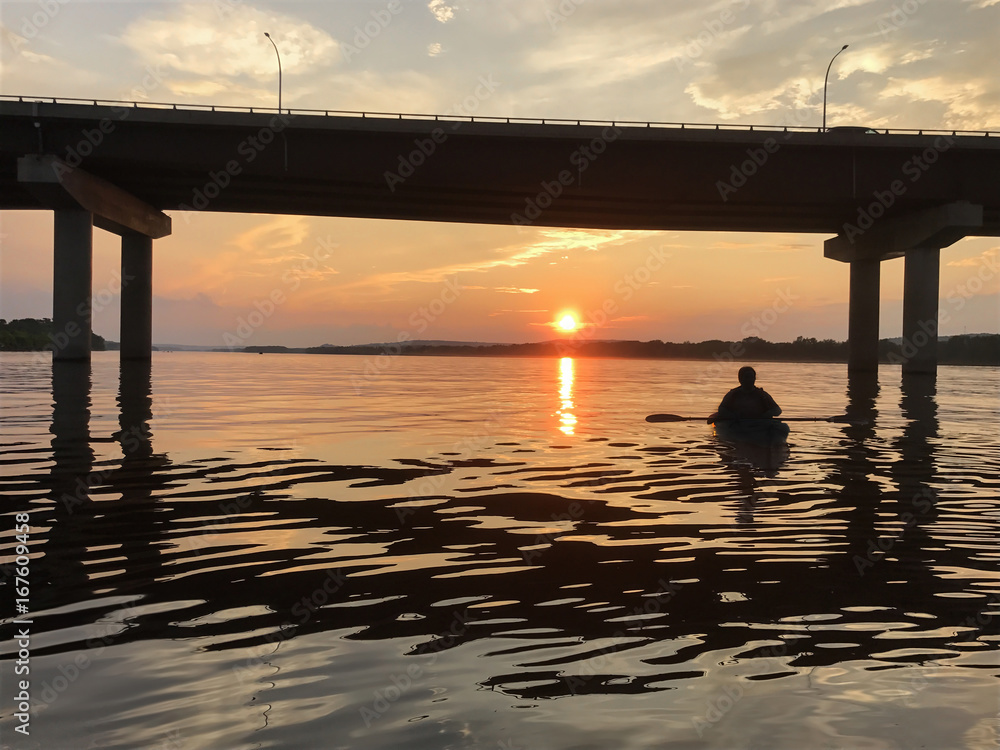 Kayaking at sunset in Fredericton on the Saint John River , New Brunswick, Canada
