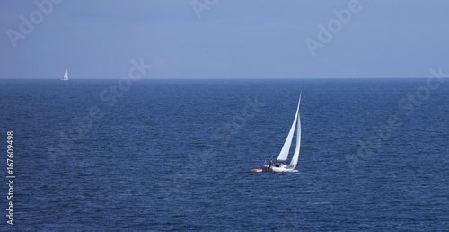 Sailboat on blue sea © svenaw