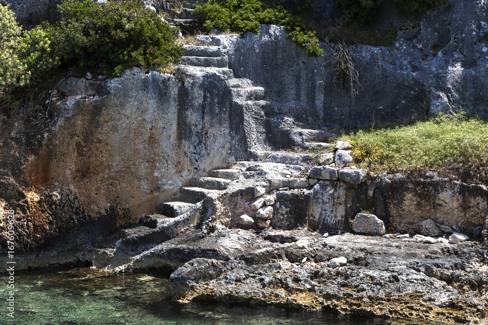 Flooded ancient Lycian city as a result of the earthquake city. Near the city of Simena in the vicinity of Kekova Turkey. Flooded ancient Lycian city as a result of the earthquake city. Near the city of Simena in the vicinity of Kekova Turkey.