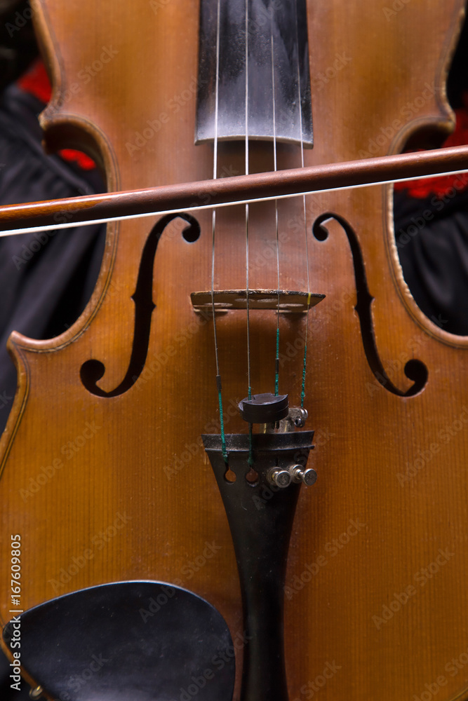 Photo of violin and fiddlestick, closeup Photo of violin and fiddlestick, closeup