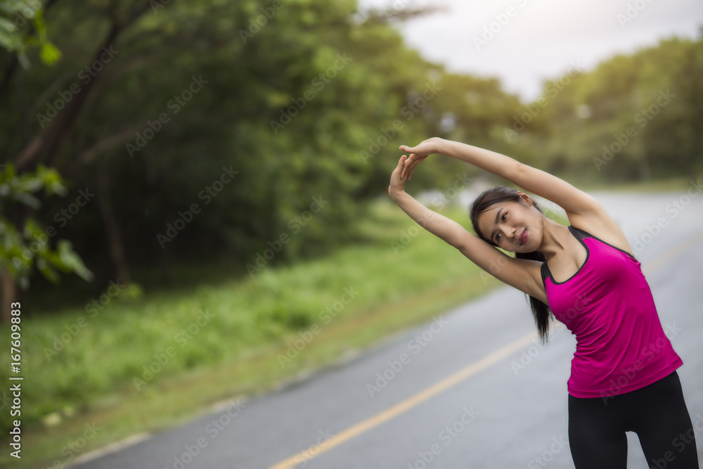 Women warm up before a morning workout Women warm up before a morning workout