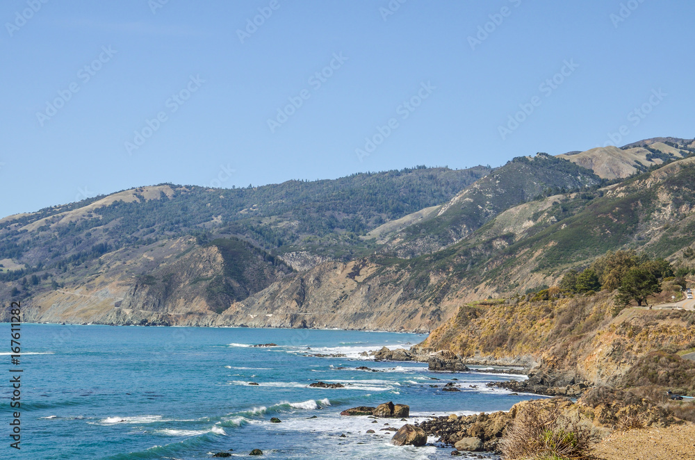 Central California coast with beach, cliffs and blue ocean in Big Sur