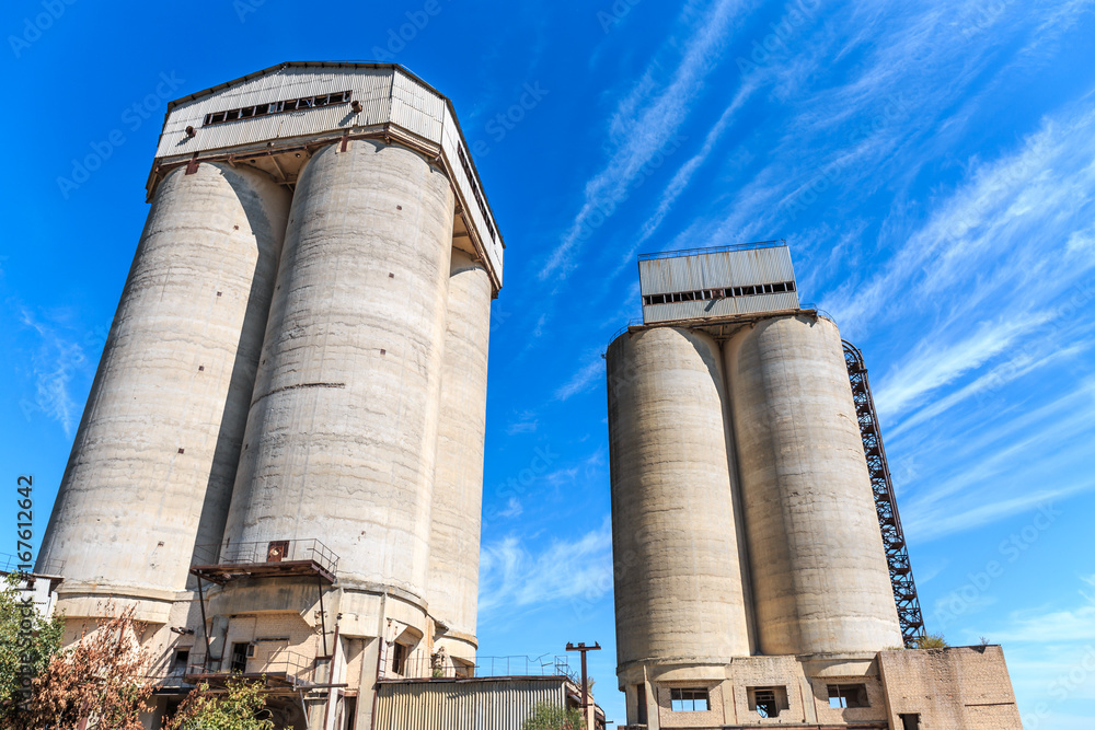 Two concrete towers of agricultural elevator 