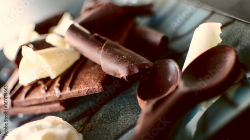 Fotografia Rich Chocolate dessert photography with chocolate square cookie draped in chocol