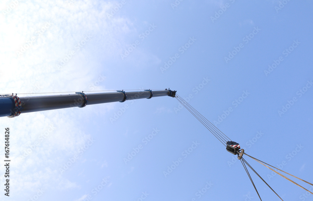 big hydraulic arm of a powerful crane for lifting loads big hydraulic arm of a powerful crane for lifting loads