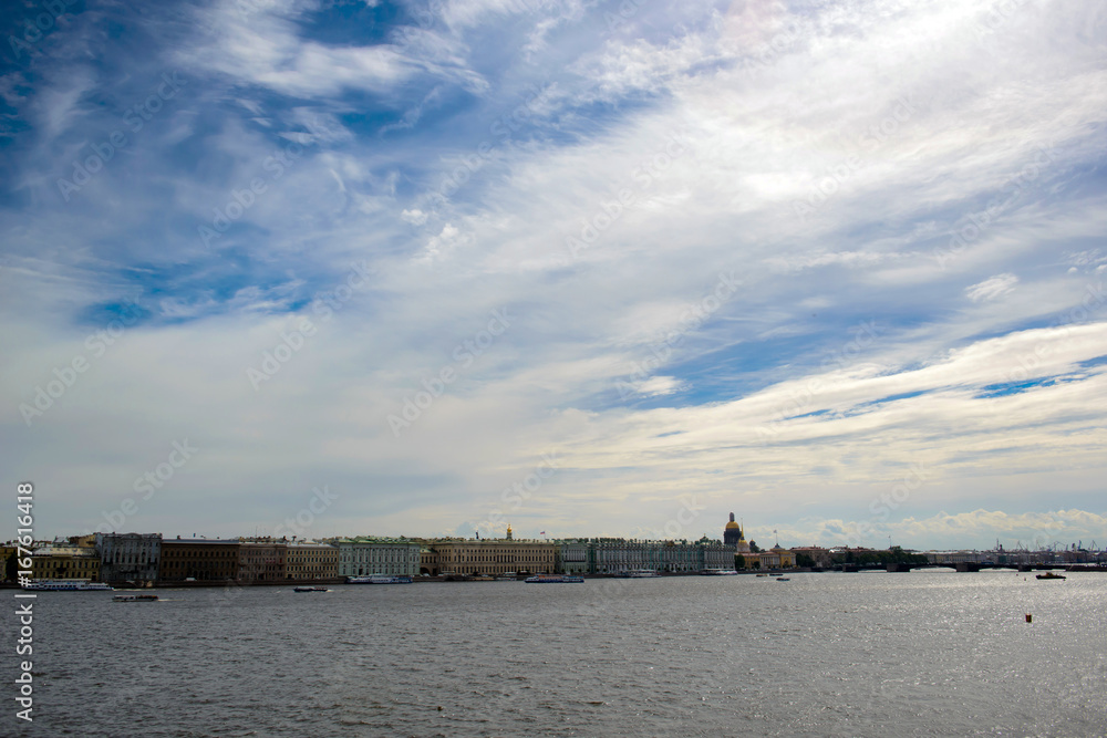 View of panorama Palace Embankment of St. Petersburg from the river Neva - popular tourist city in Russia.