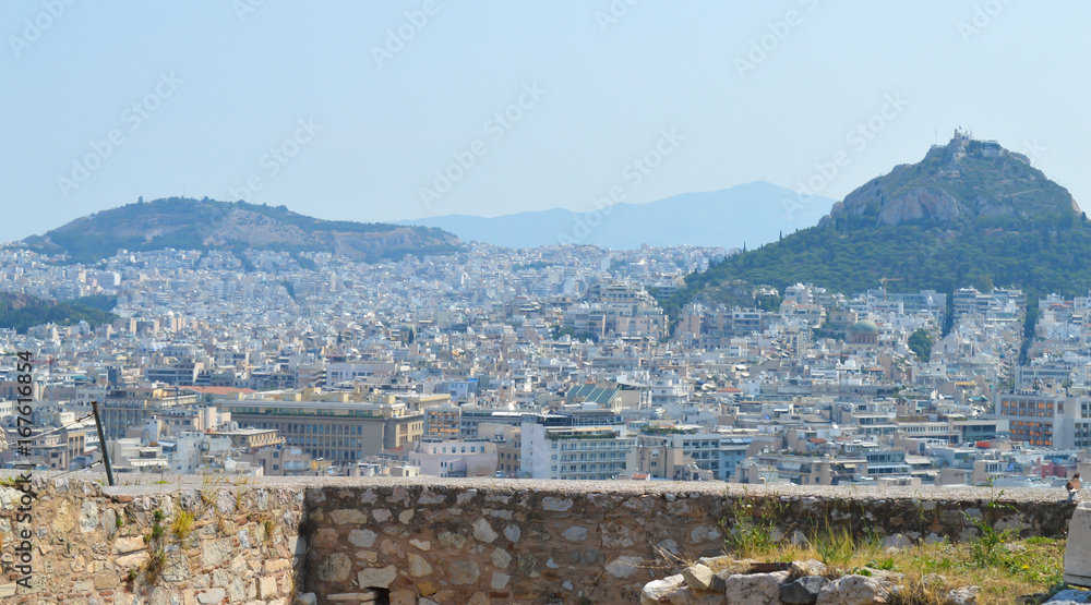 ATHENS, GREECE - JUNE 16: City view from Acropolis in Athens, Greece on June 16, 2017. 