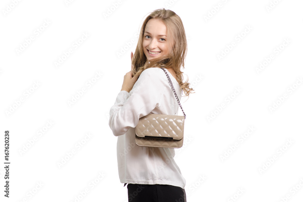 Beautiful girl with a lacquer bag on her shoulder Beautiful girl with a lacquer bag on her shoulder