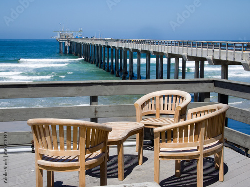 Pier and patio chairs, La Jolla, California © Alan