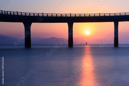 Fototapeta Naklejka Na Ścianę i Meble -  Xiamen Yanwu Bridge Sunset Scenery Around The Huandao Road