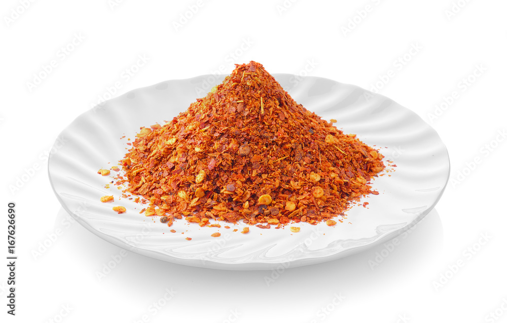 Cayenne pepper in a plate on white background Cayenne pepper in a plate on white background