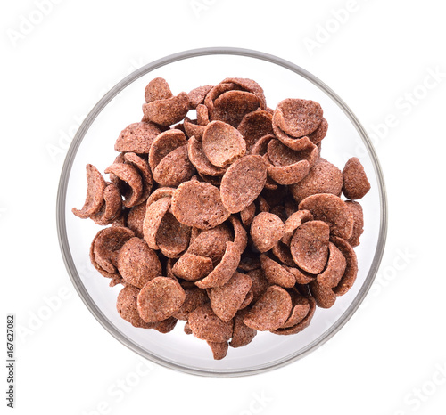 Chocolate corn flakes in a bowl on white background