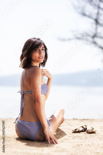 girl sunbathing on a beach