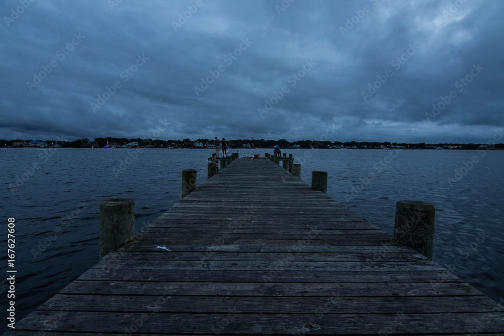 Naklejka premium Stormy night on the boardwalk