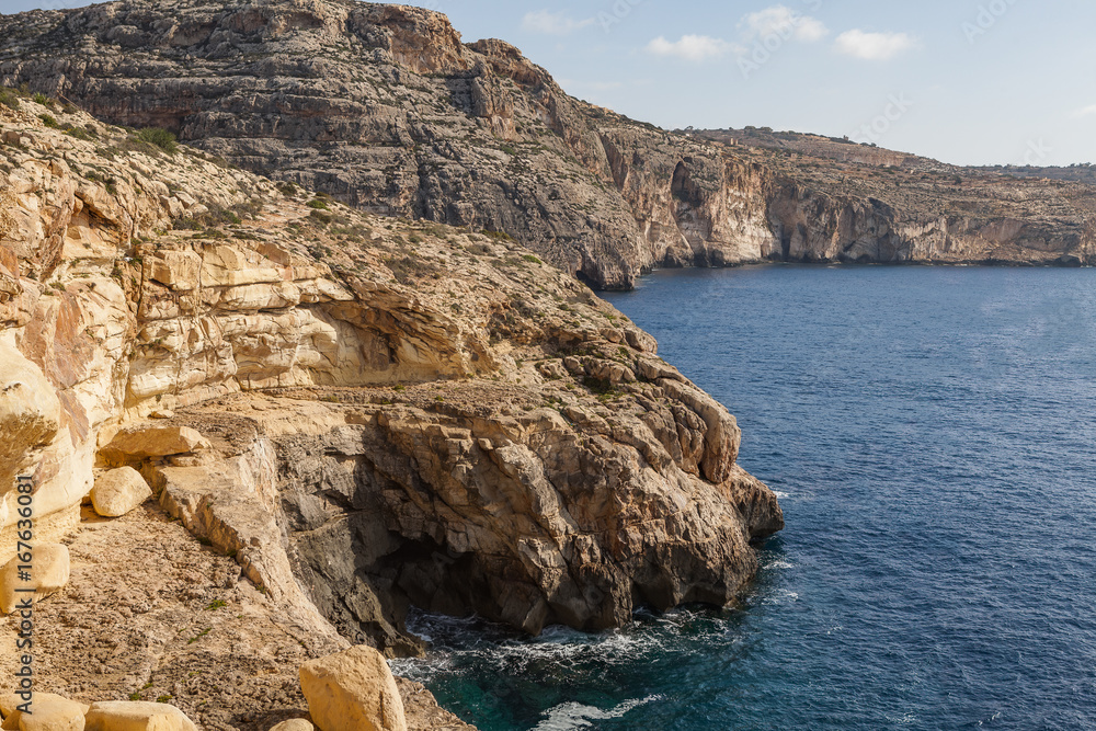 Obraz premium Blue Grotto limestone cliff, majestic nature landmark of Malta island