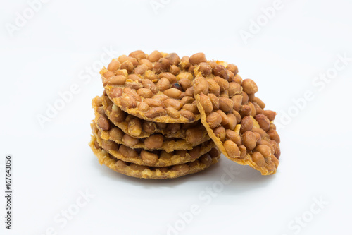 Homemade sweet peanut cookies on white background photo