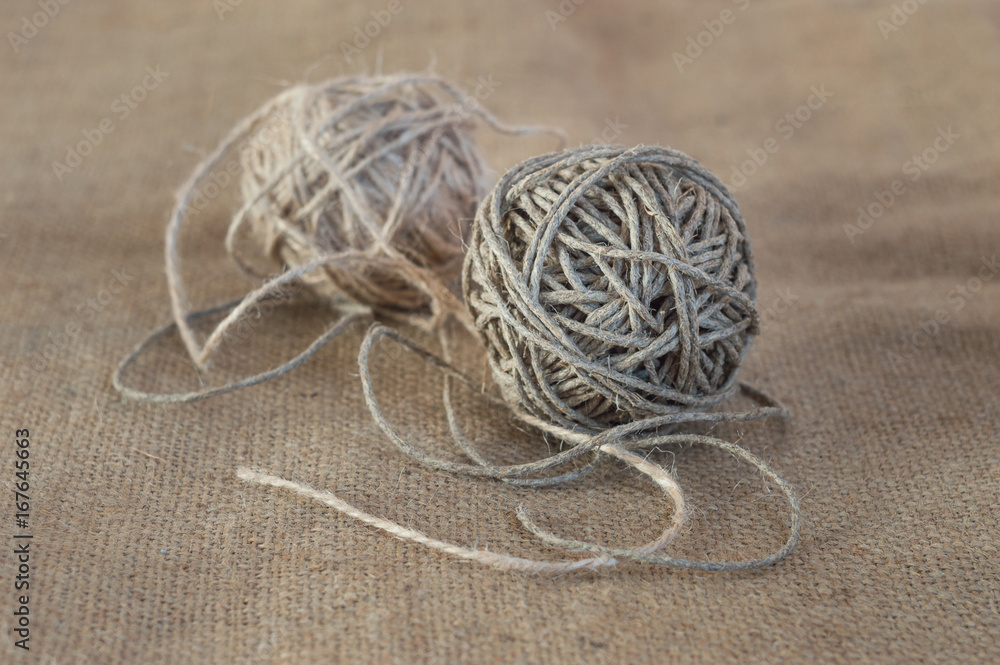 On the canvas lie curls twine On the canvas lie curls twine
