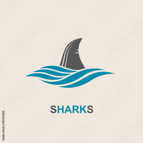 icon of angry shark fin with sea waves