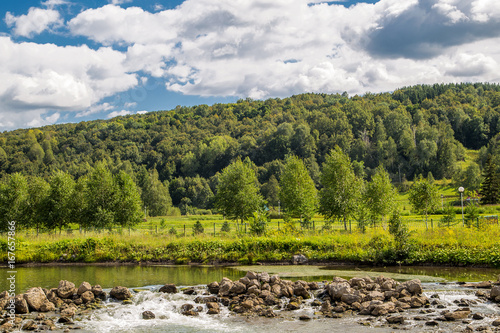 Water sharpens stones on the river
 photo