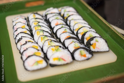 Quadro em tela Sushi at a large plate, lot of pieces