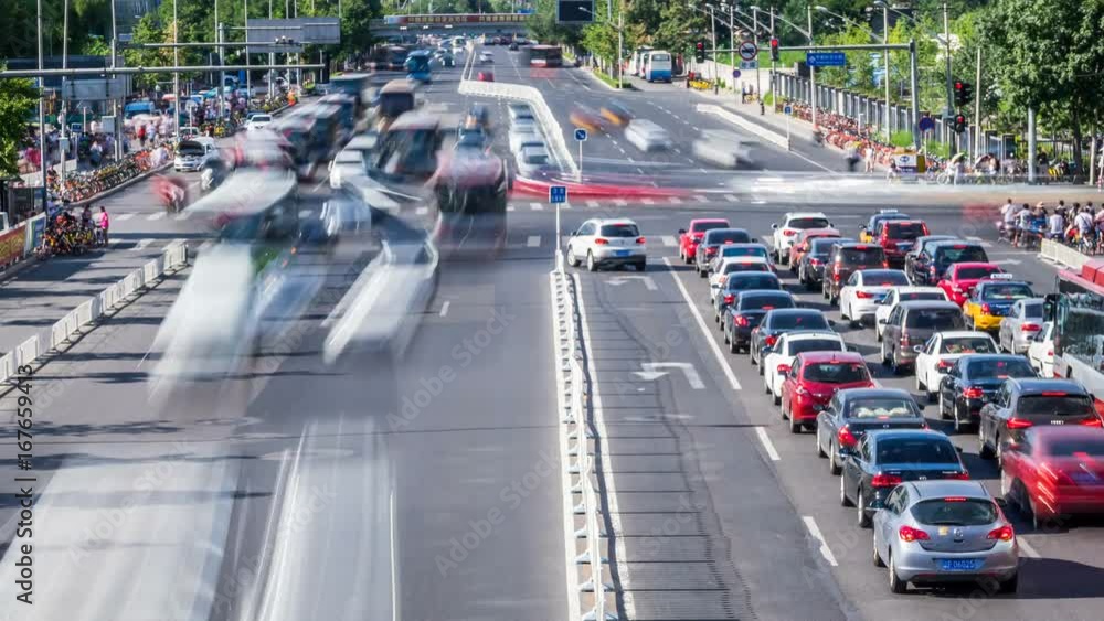 Time lapse of busy traffic and modern buildings in Beijing city , China. Time lapse of busy traffic and modern buildings in Beijing city , China.