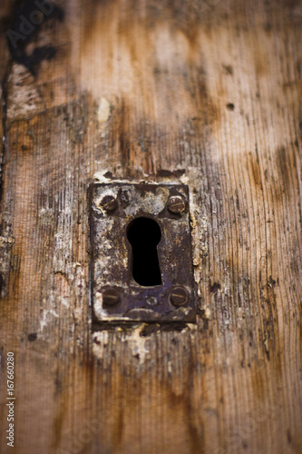 Old aged keyhole on the wooden door in Antalya Turkey