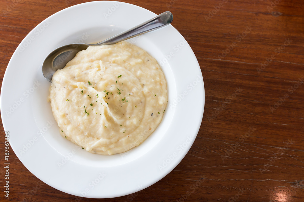 mashed potato with a spoon mashed potato with a spoon