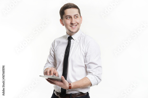 Businessman men with tablet in hand with a white shirt.