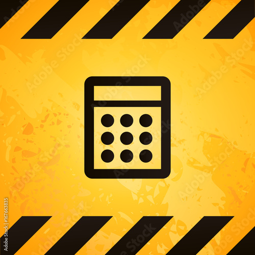 danger sign with a calculator