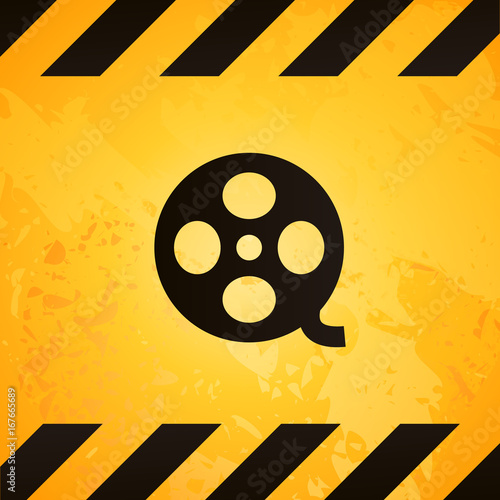danger sign with film icon