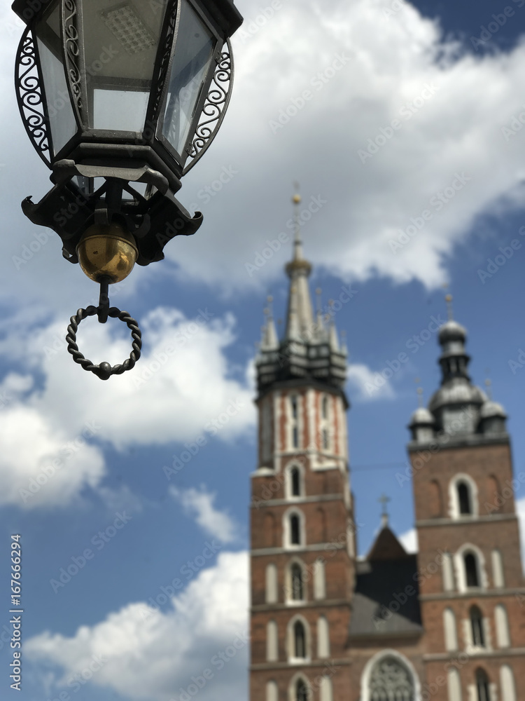 Lantern with in the background the St. Mary's Basilica Lantern with in the background the St. Mary's Basilica