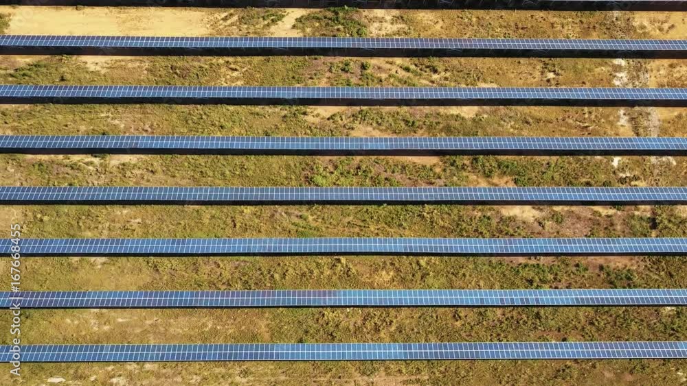Aerial View. Flying over the solar power plant with sun. Solar panels and sun. Aerial drone shot. 4K 30fps ProRes (HQ). Aerial View. Flying over the solar power plant with sun. Solar panels and sun. Aerial drone shot. 4K 30fps ProRes (HQ).