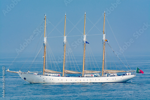 Traditional Tallship Sailing Against Sea and Sky