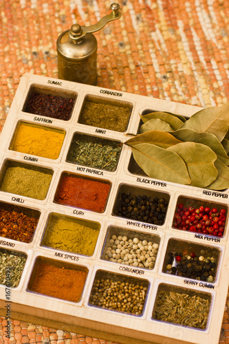 Spices, kitchen herbs and flavoring photo