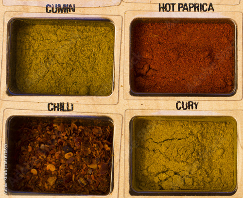 Spices, kitchen herbs and flavoring photo