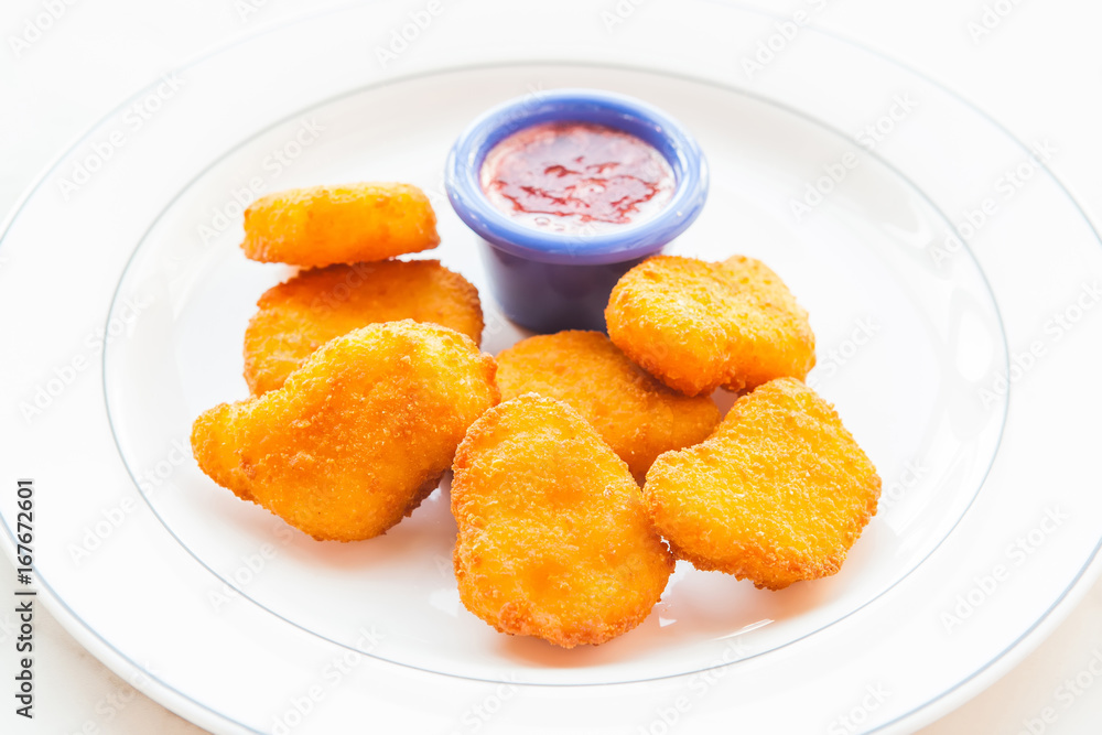 Cheese nuggets in a white plate
Cheese nuggets in a white plate