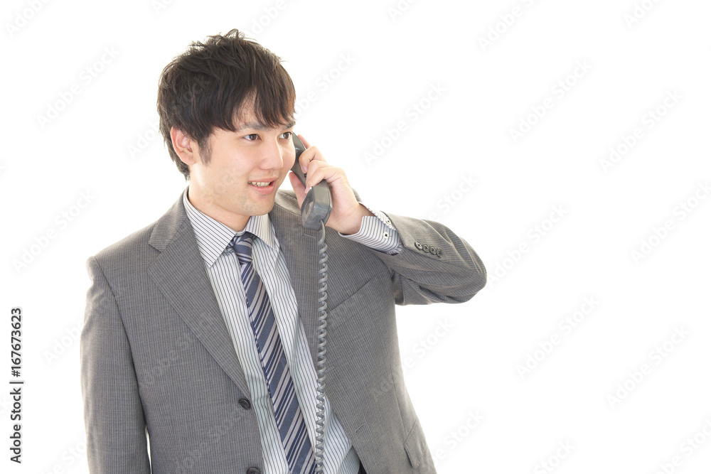 通話中のビジネスマン 通話中のビジネスマン