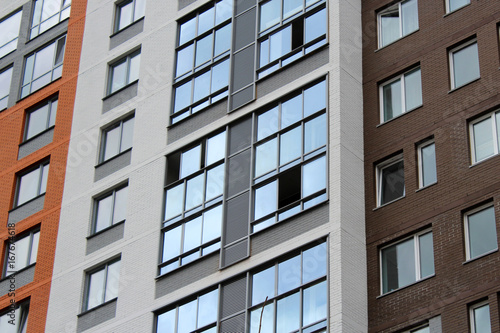 The facade of a high-rise residential building. Beautiful design and architecture.