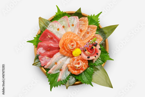 Japanese food raw fish mixed sashimi in brown wooden bowl (maguro, otoro, salmon, sea bass, hamachi) on white background