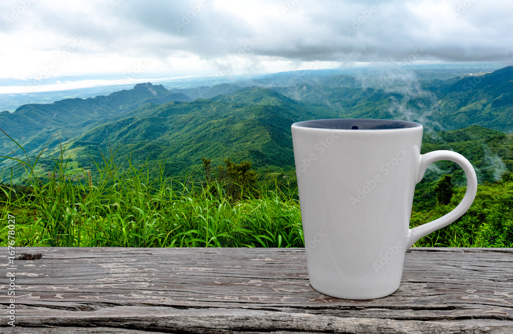 Obraz premium cup of coffee on abstract nature background