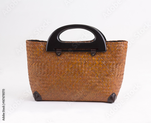 Brown wicker handbag with wooden handles