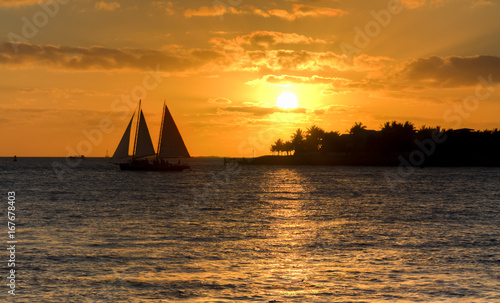sailboat cruise at sunset
