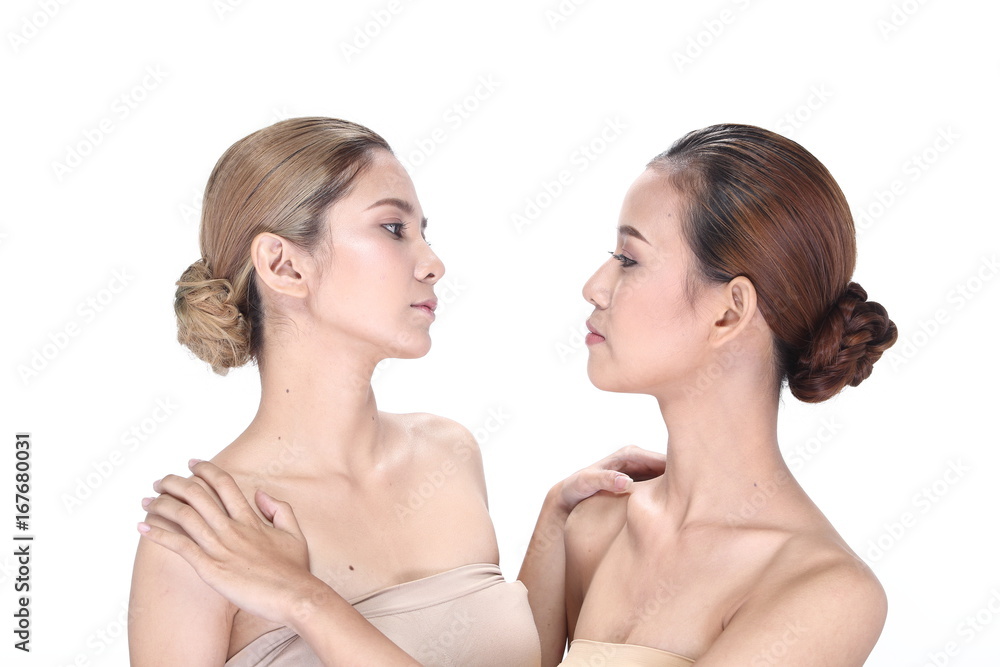 Two Asian women with beautiful fashion make up wrapped hair Two Asian women with beautiful fashion make up wrapped hair