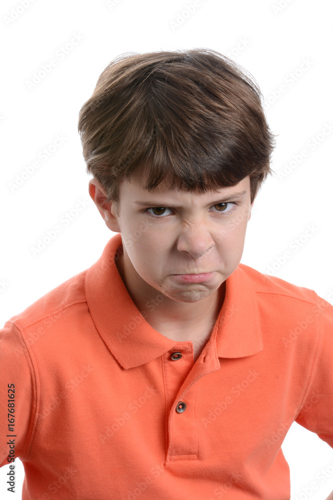 boy with mad facial expression isolated white background boy with mad facial expression isolated white background