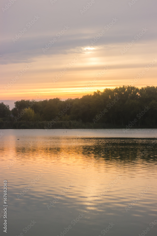 Evening in the river hill surrounded by forest and town Evening in the river hill surrounded by forest and town