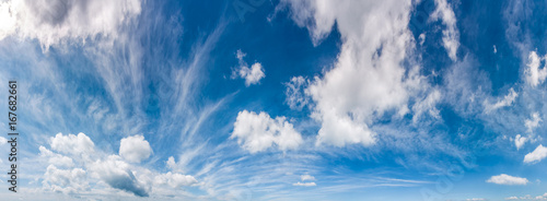gorgeous cloudscape panorama on a blue summer sky