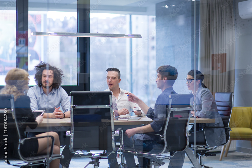 Startup Business Team At A Meeting at modern office building