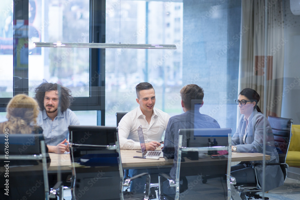 Fototapeta premium Startup Business Team At A Meeting at modern office building