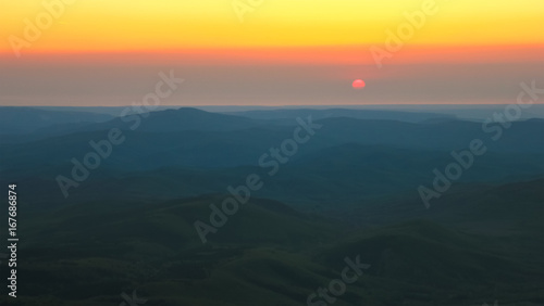 Belt of Venus during sunrise in mountains