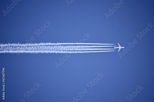 A jet plane leaving a condensation trail